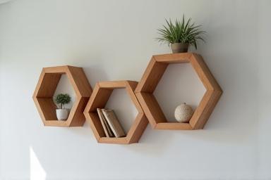 Floating hexagon shelf set on a wall